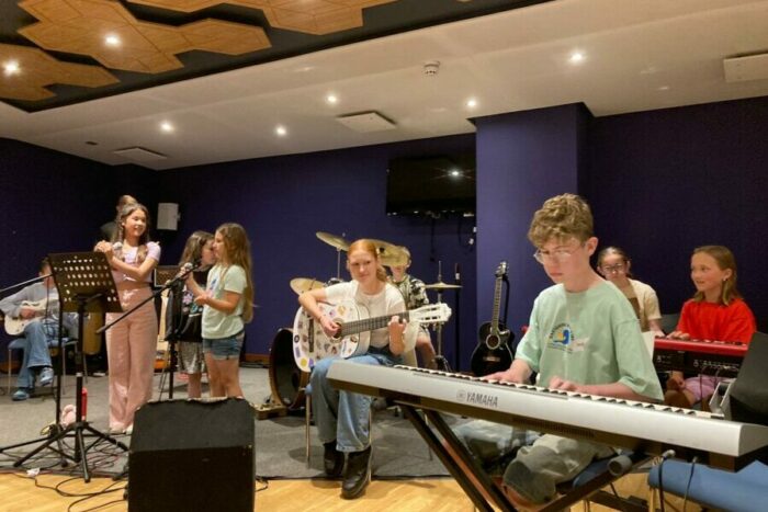 five young people play in a band