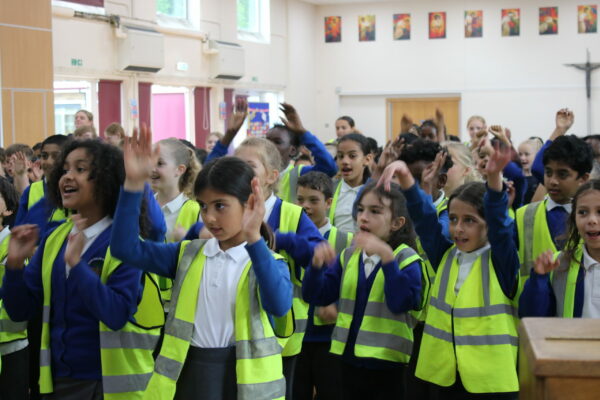A group of children sing